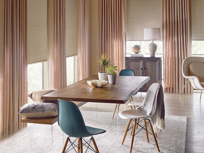 A dining room with storage cabinet.